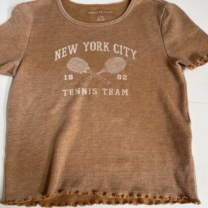 cute new york tennis tee, never worn but no tags, brand american eagle